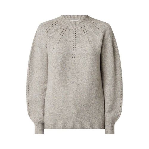 Sweter z ażurowym wzorem 199.99PLN