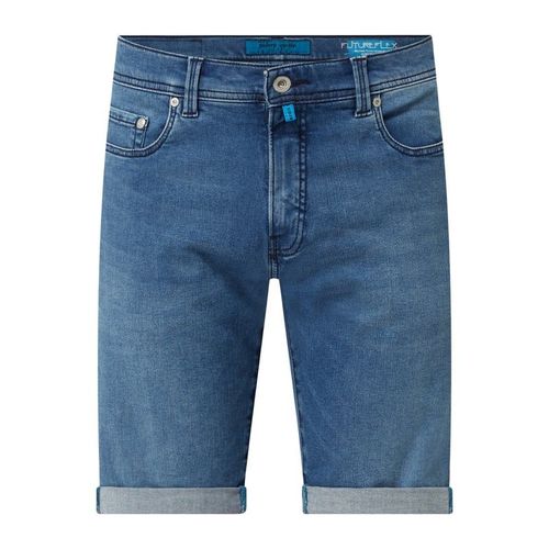 Spodnie jeansowe o kroju tapered fit z dodatkiem streczu model ‘Lyon’ — ‘Futureflex’ 229.99PLN