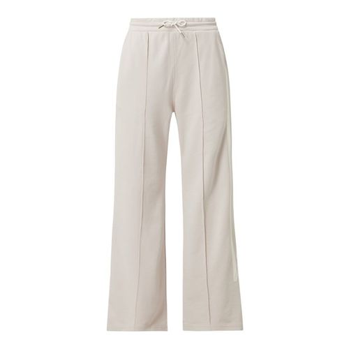 Spodnie dresowe z rozkloszowaną nogawką z bawełny ekologicznej 279.99PLN